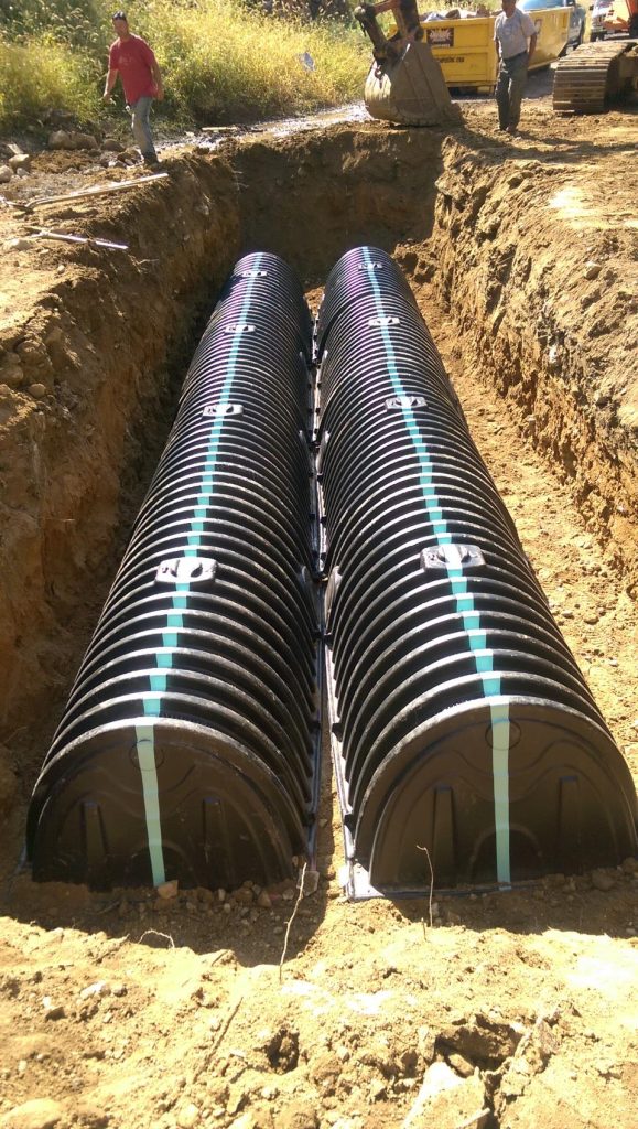 Underground drainage system installation in progress.